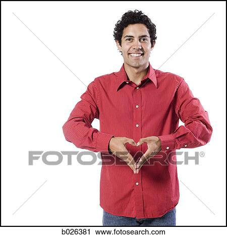 man making heart shape with his hands View Large Photo Image Stock Image - man making heart shape with his hands. Fotosearch