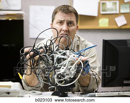 man trying to figure out computer wiring View Large Photo Image Stock Image - man trying to figure out computer wiring. Fotosearch