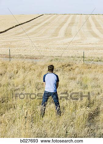 man urinating along the side of road View Large Photo Image Stock Image - man urinating along the side of road. Fotosearch