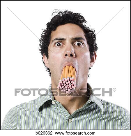 man with a mouth full of pencils View Large Photo Image Stock Image - man with a mouth full of pencils. Fotosearch