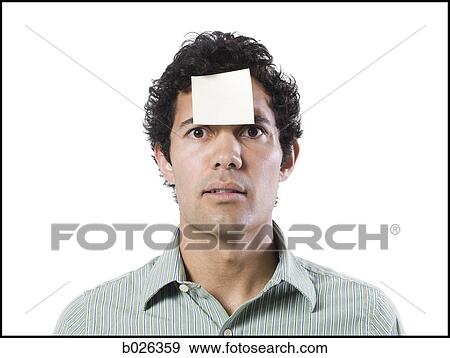 man with a post it note on his forehead View Large Photo Image Stock Photo - man with a post it note on his forehead. Fotosearch