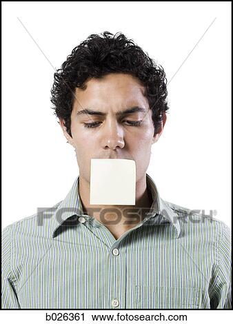 man with a post it note over his mouth View Large Photo Image Stock Image - man with a post it note over his mouth. Fotosearch