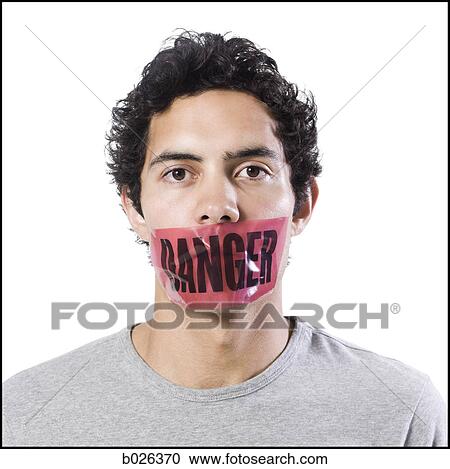 man with danger tape over mouth View Large Photo Image Stock Image - man with danger tape over mouth. Fotosearch