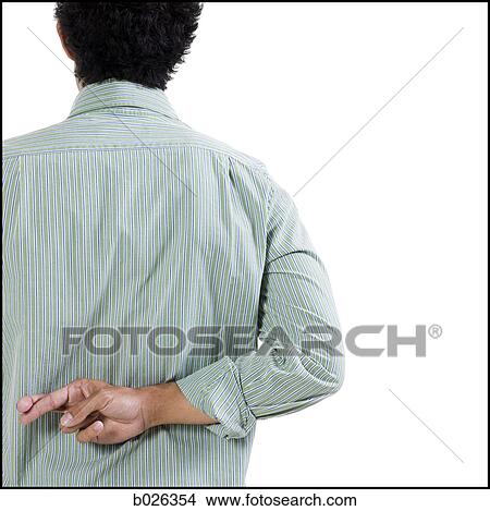 man with fingers crossed behind his back View Large Photo Image Picture - man with fingers crossed behind his back. Fotosearch