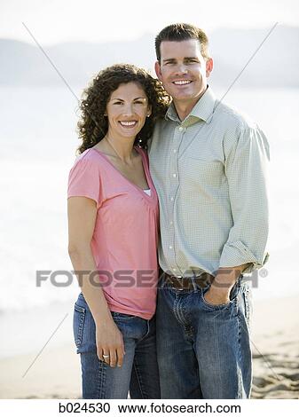mid adult couple at the beach View Large Photo Image Stock Image - mid adult couple at the beach. Fotosearch