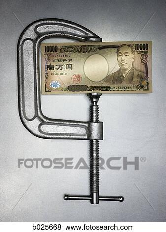 money in a clamp View Large Photo Image Stock Photo - money in a clamp. Fotosearch