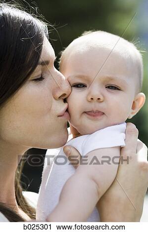 Stock Image - mother and baby girl. Fotosearch