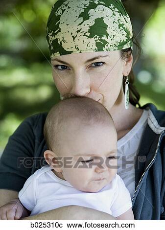 Stock Image - mother and baby girl. Fotosearch