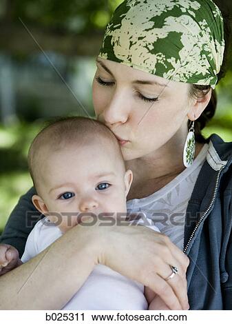 Stock Image - mother and baby girl. Fotosearch