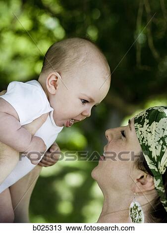 Stock Image - mother and baby girl. Fotosearch