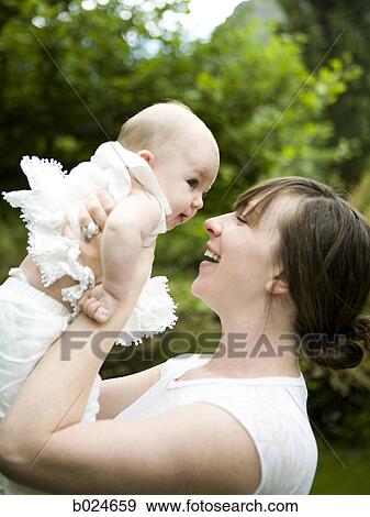 Stock Photo - mother and baby girl. Fotosearch