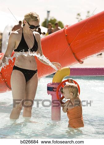 mother and daughter at a waterpark View Large Photo Image Picture - mother and daughter at a waterpark. Fotosearch