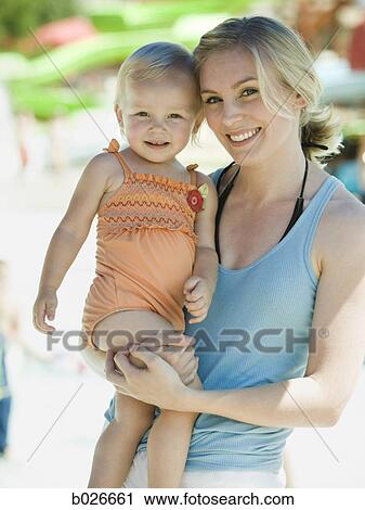mother and daughter at a waterpark View Large Photo Image Stock Image - mother and daughter at a waterpark. Fotosearch