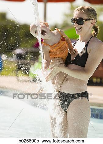 mother and daughter at a waterpark View Large Photo Image Stock Image - mother and daughter at a waterpark. Fotosearch