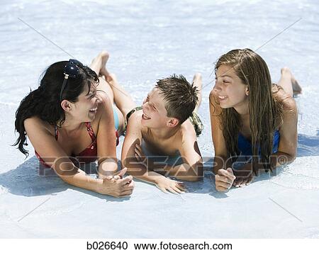 mother and two children at a waterpark View Large Photo Image Stock Image - mother and two children at a waterpark. Fotosearch