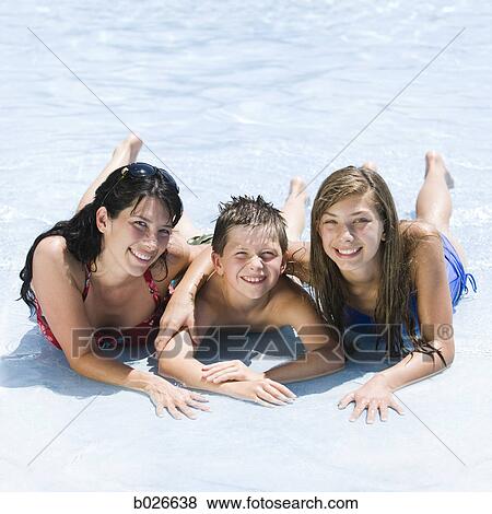 mother and two children at a waterpark View Large Photo Image Stock Photo - mother and two children at a waterpark. Fotosearch
