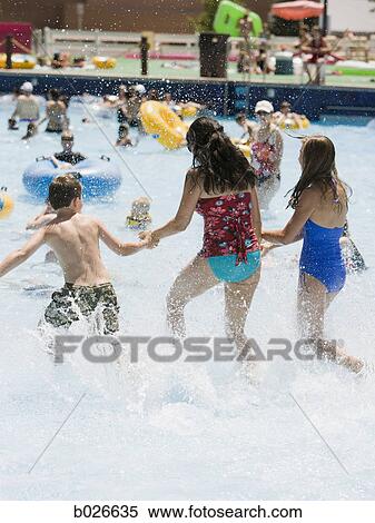 mother and two children at a waterpark View Large Photo Image Stock Photography - mother and two children at a waterpark. Fotosearch