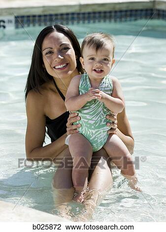 mother swimming with her baby girl View Large Photo Image Stock Image - mother swimming with her baby girl. Fotosearch