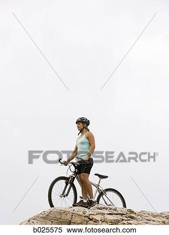 mountain biker on a rocky ridge View Large Photo Image Stock Photography - mountain biker on a rocky ridge. Fotosearch