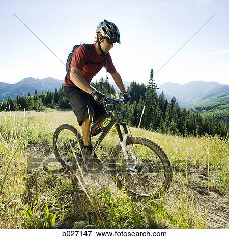mountain biker on a trail View Large Photo Image Stock Photo - mountain biker on a trail. Fotosearch