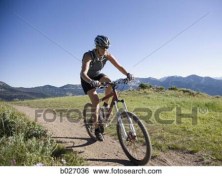 Stock Photograph - mountain biker. Fotosearch