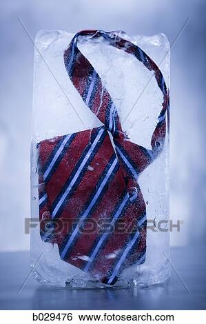 Stock Photograph - necktie frozen in a block of ice. Fotosearch
