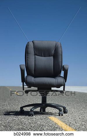office chair in the middle of the road View Large Photo Image Stock Photo - office chair in the middle of the road. Fotosearch
