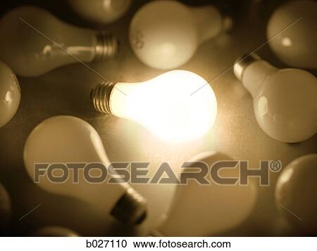 one light bulb lit up among many View Large Photo Image Stock Image - one light bulb lit up among many. Fotosearch