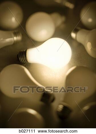 one light bulb lit up among many View Large Photo Image Stock Image - one light bulb lit up among many. Fotosearch