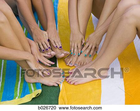 painted fingers and toes of four young women View Large Photo Image Stock Image - painted fingers and toes of four young women. Fotosearch