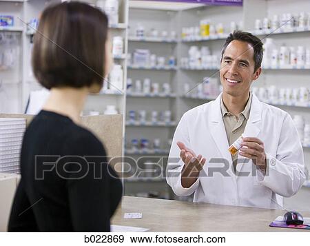 Stock Photo - pharmacist at work. Fotosearch