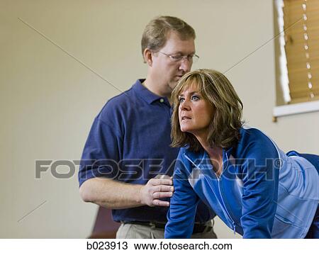 physical therapist working with a woman View Large Photo Image Stock Image - physical therapist working with a woman. Fotosearch