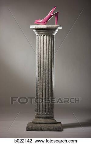 pink high heel shoe on a pedestal View Large Photo Image Stock Image - pink high heel shoe on a pedestal. Fotosearch