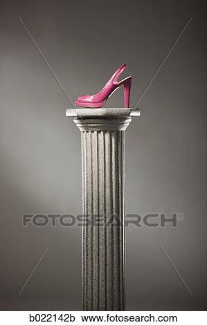 pink high heel shoe on a pedestal View Large Photo Image Stock Image - pink high heel shoe on a pedestal. Fotosearch