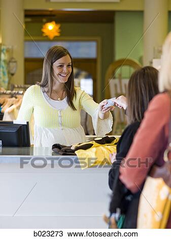pregnant clothing store clerk View Large Photo Image Stock Image - pregnant clothing store clerk. Fotosearch