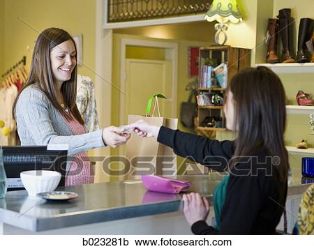 pregnant clothing store clerk View Large Photo Image Stock Image - pregnant clothing store clerk. Fotosearch