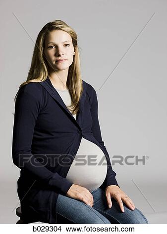 Picture - pregnant woman. Fotosearch