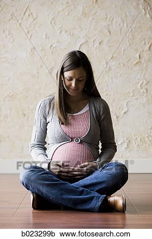 Stock Image - pregnant woman. Fotosearch