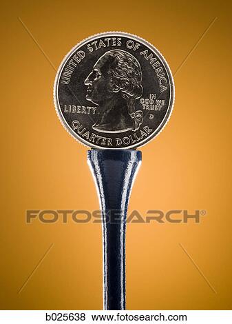 quarter on a golf tee View Large Photo Image Stock Photo - quarter on a golf tee. Fotosearch