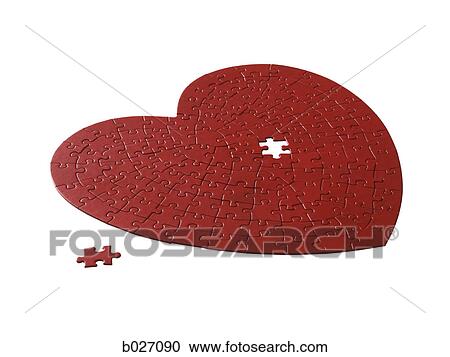 red heart shaped jigsaw puzzle on a white background View Large Photo Image Stock Image - red heart shaped jigsaw puzzle on a white background. Fotosearch