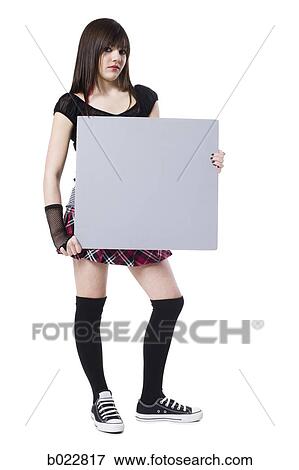 Stock Photo - rocker girl holding a sign. Fotosearch