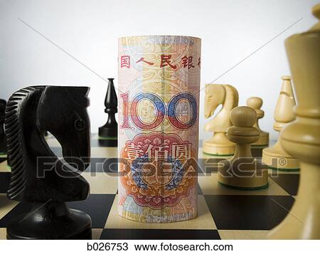 rolled currency on a chess board View Large Photo Image Stock Image - rolled currency on a chess board. Fotosearch