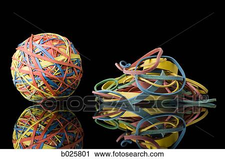 rubber band ball next to a pile of rubber bands View Large Photo Image Stock Image - rubber band ball next to a pile of rubber bands. Fotosearch
