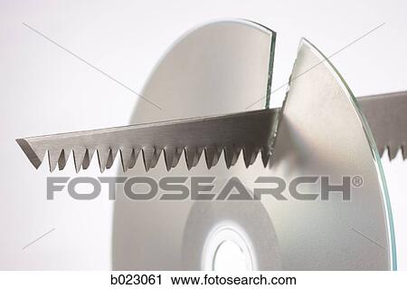 saw cutting a cd View Large Photo Image Stock Image - saw cutting a cd. Fotosearch