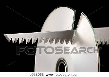 saw cutting a cd View Large Photo Image Stock Image - saw cutting a cd. Fotosearch
