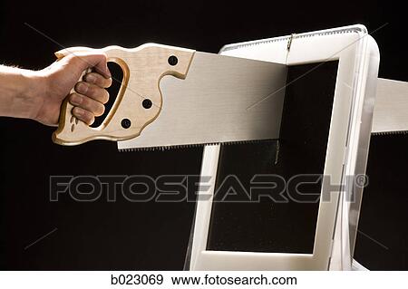 saw cutting a computer monitor View Large Photo Image Stock Photo - saw cutting a computer monitor. Fotosearch