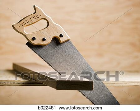 saw in a piece of wood View Large Photo Image Stock Image - saw in a piece of wood. Fotosearch