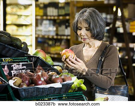 senior woman at the supermarket View Large Photo Image Stock Image - senior woman at the supermarket. Fotosearch