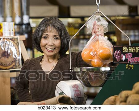 senior woman at the supermarket View Large Photo Image Stock Image - senior woman at the supermarket. Fotosearch