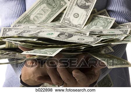 senior woman with hands full of dollars View Large Photo Image Stock Photo - senior woman with hands full of dollars. Fotosearch